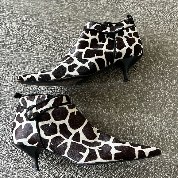 Leather and fur booties from Saks. - Picture 1 of 5